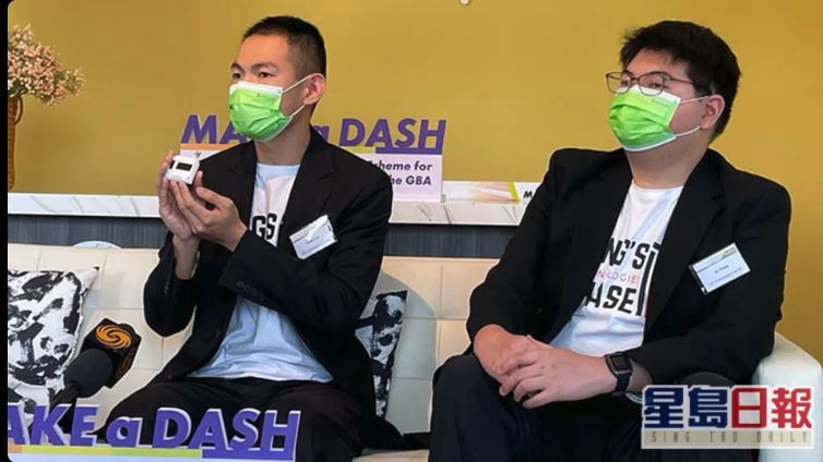 Gavin Lou presenting a breath-analysis prototype during MAKE a DASH press coverage