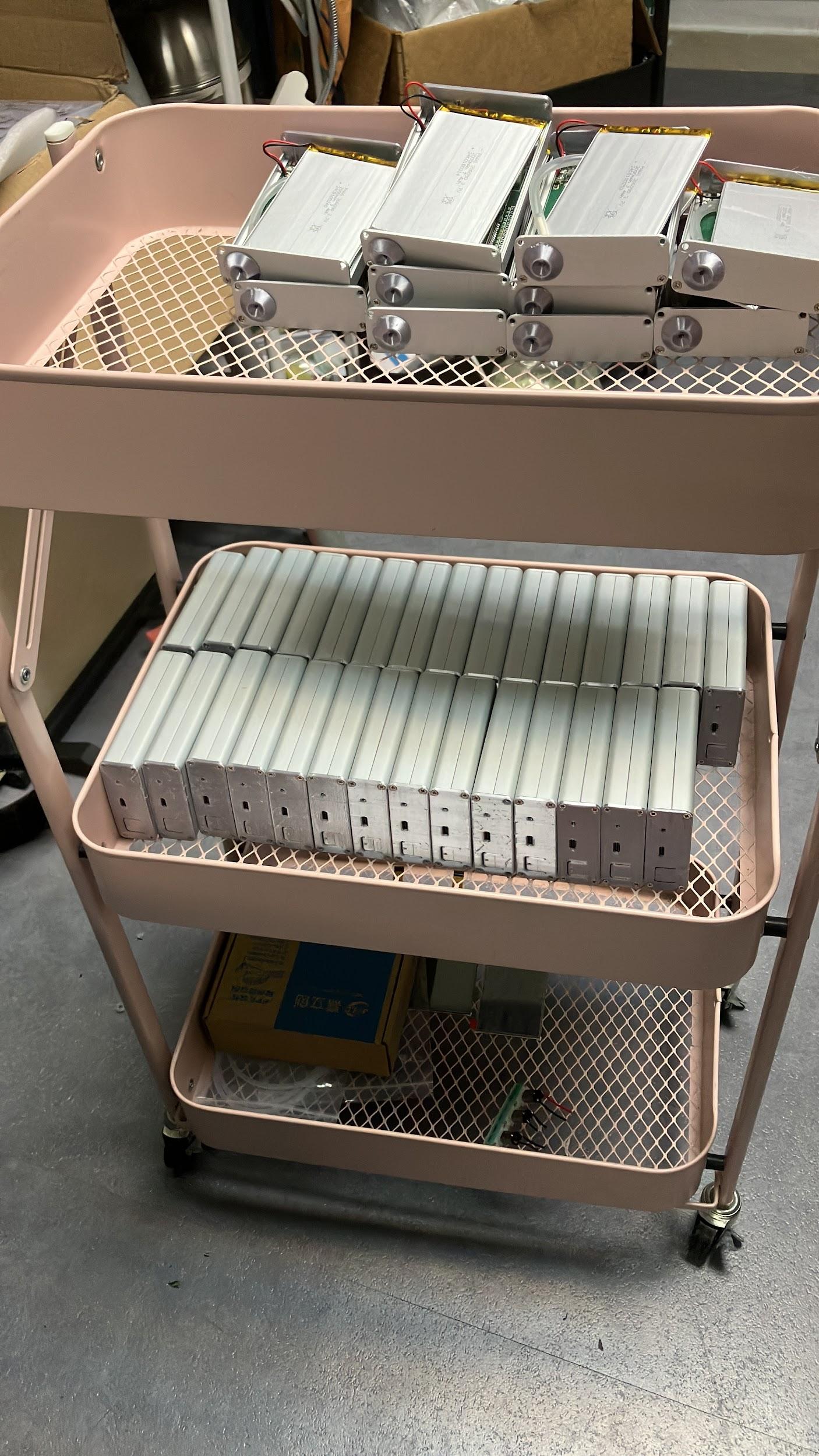Production cart holding multiple silver breath-analysis prototype units